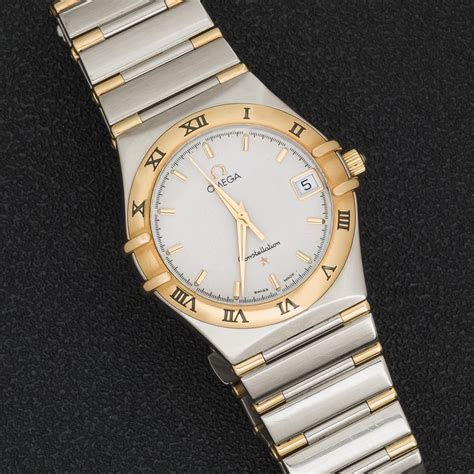 reloj de oro marca omega modelo constellation